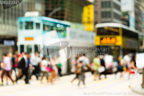 Image of Group of busy people passong the road