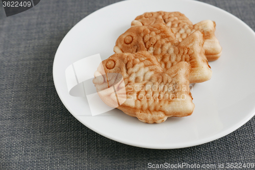 Image of Japanese confectionery taiyaki fish cake wagashi on plate