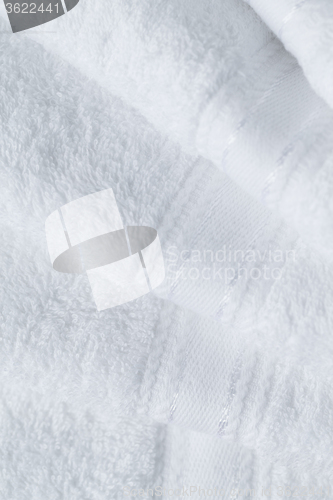 Image of Stack of new white towel