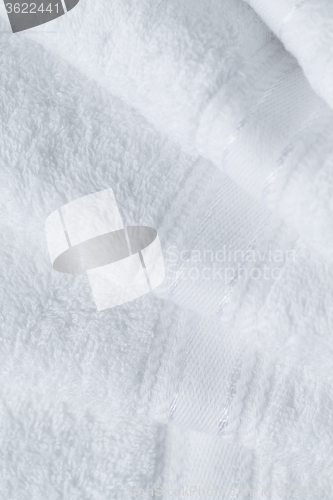 Image of Stack of new white towel