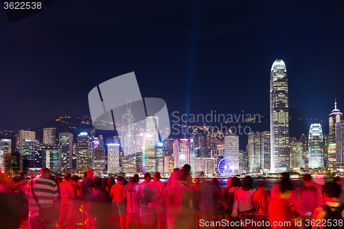 Image of Many people watching the light show in Hong Kong at night