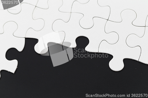 Image of Plain puzzle on black background