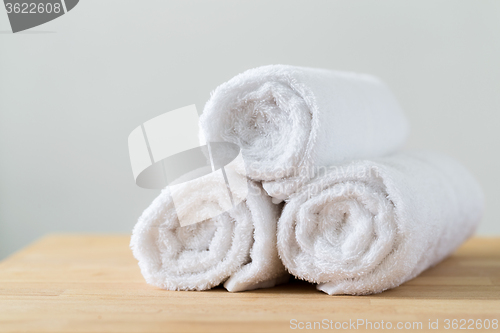 Image of Roll of white towel for spa