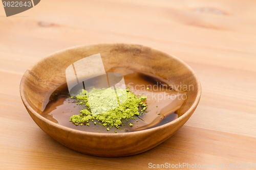 Image of Japanese confectionery with green tea powder and black sugar sau