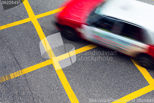 Image of Motion blurred Taxis in Hong Kong