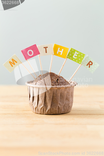 Image of Flag on muffin with a word mother
