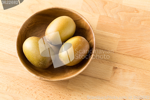 Image of Three gold kiwi 