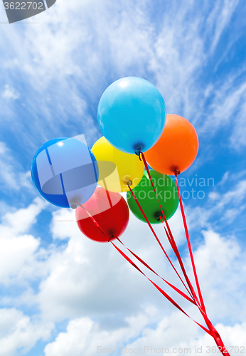 Image of Color air balloon on blue sky background