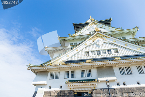 Image of Osaka castle in Japan with clear blue sky