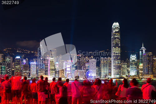 Image of Group of people watching the light show