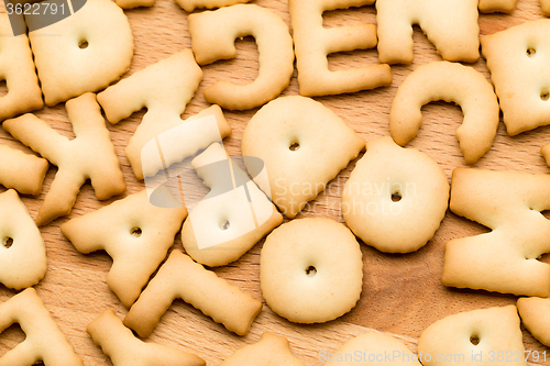 Image of Word Biscuit over wooden table