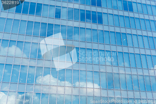 Image of Blue clean glass wall of modern skyscraper