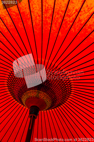 Image of Japanese style red mulberry paper umbrella
