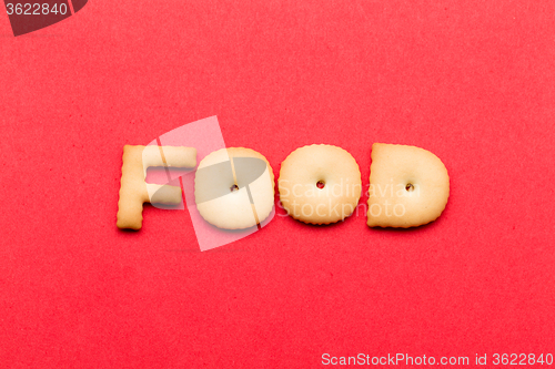 Image of Food biscuit over the red background