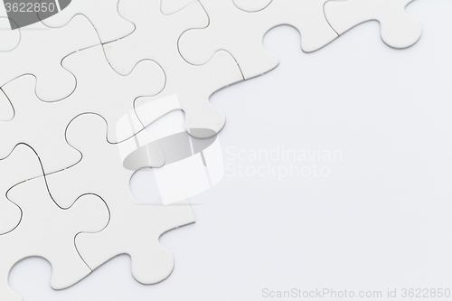 Image of White puzzle on the table