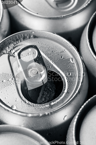 Image of Top of open wet beer can close up