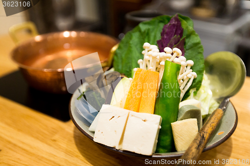 Image of Japanese cuisine, hot pot on background