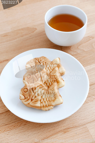 Image of Taiyaki fish cake with cup of tea