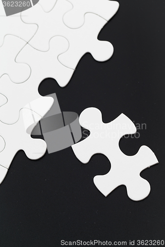 Image of White puzzle on the table