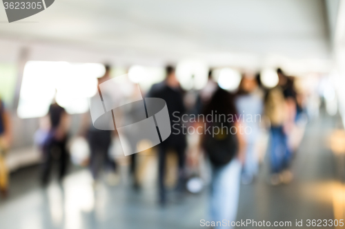 Image of Blur bokeh of footbridge with crowded pedestrian