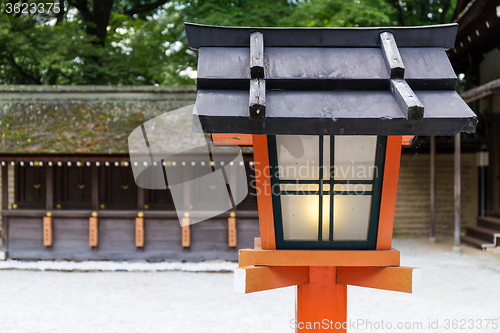 Image of Traditional red lamp pole in Japanese temple