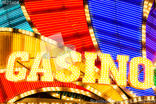 Image of Neon casino sign lit up at night