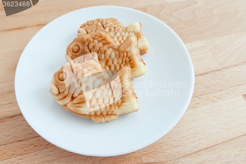 Image of Japanese fish-shaped cake Taiyaki on the plate