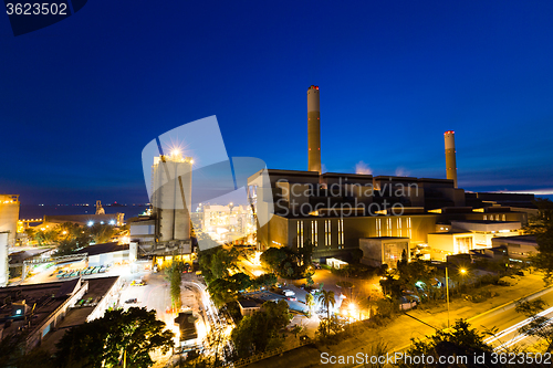 Image of Coal power station and cement plant at night