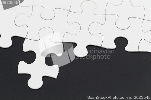 Image of Puzzle on black background