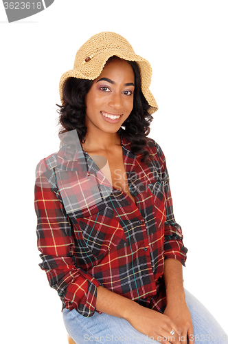 Image of African American woman with straw hat.