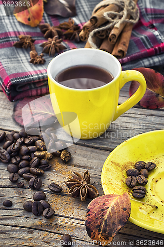 Image of Black coffee in yellow cup