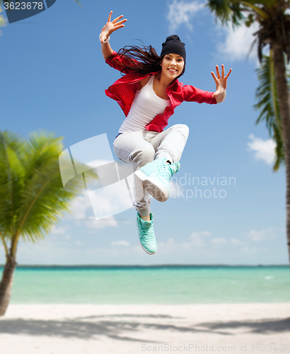 Image of beautiful dancing girl jumping