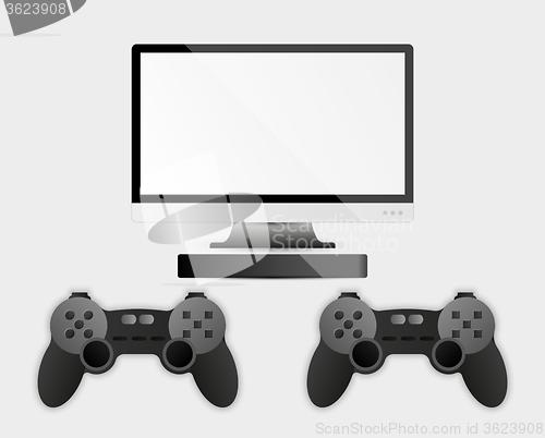 Image of game controller, television and computer box