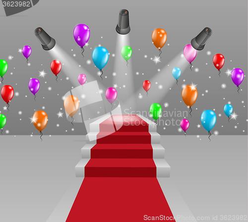 Image of stairs with red carpet and three lights