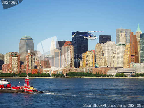 Image of Tugboat in front of Manhattan