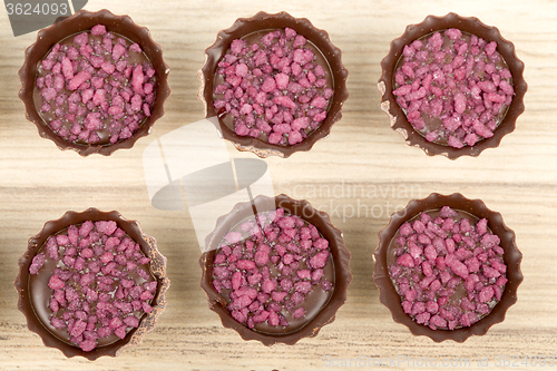 Image of small chocolate candy cakes 