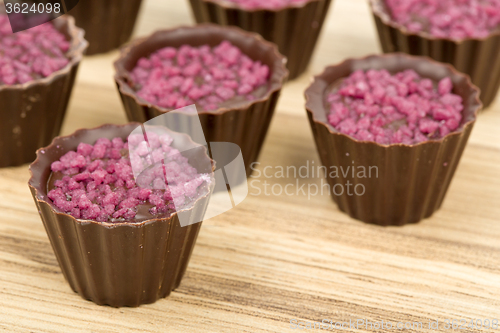 Image of small chocolate candy cakes 