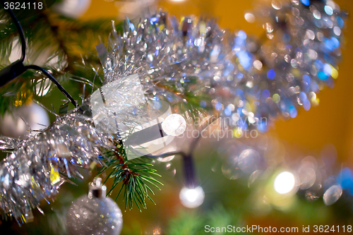 Image of Christmas decoration on tree with light