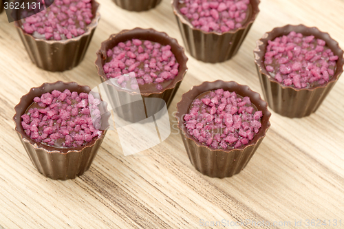 Image of small chocolate candy cakes 