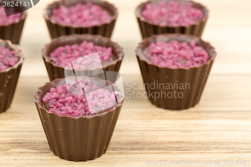 Image of small chocolate candy cakes 