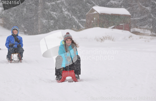 Image of Kids sliding 