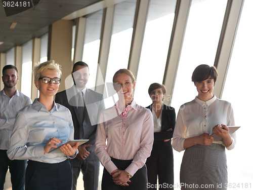 Image of business people group standing together