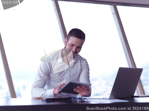 Image of young business man at office