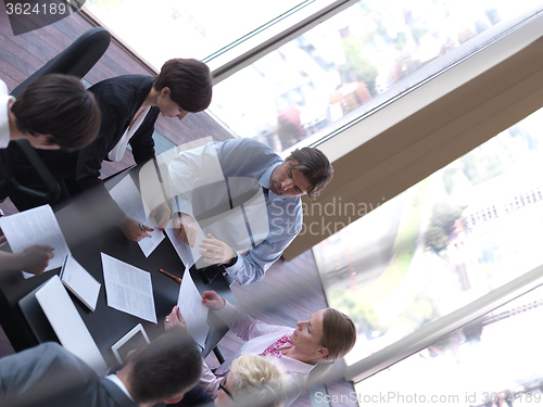 Image of business people group on meeting at bright modern office