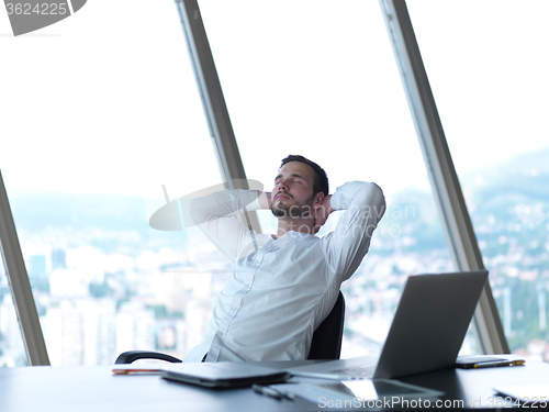 Image of young business man at office