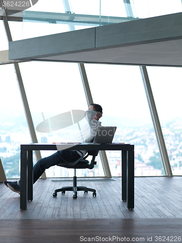 Image of young business man at office