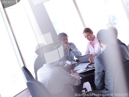 Image of business people group on meeting at bright modern office