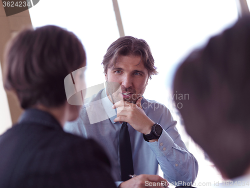 Image of business people group on meeting at bright modern office