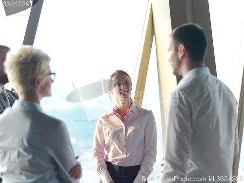 Image of business people group on meeting at bright modern office