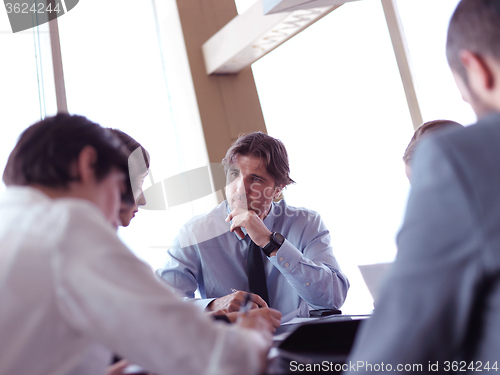 Image of business people group on meeting at bright modern office